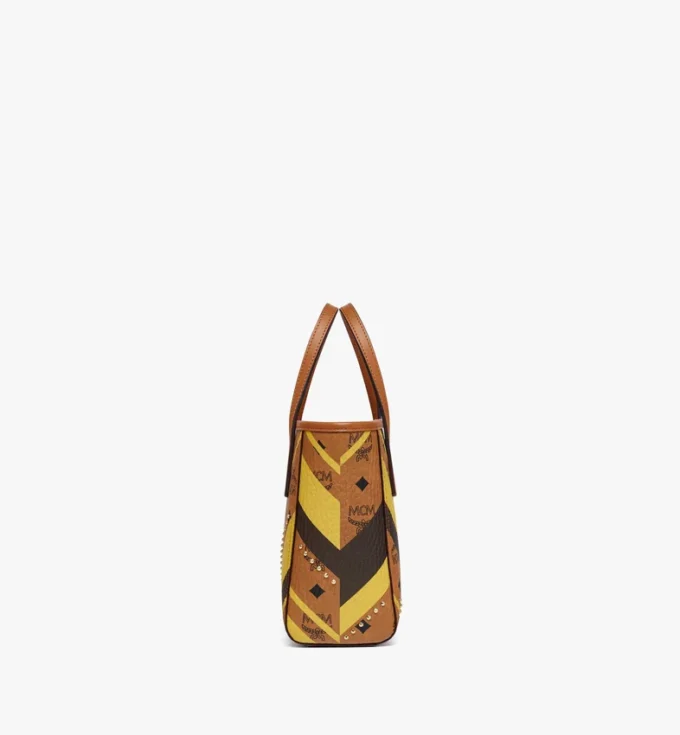 Bolso shopper Toni con cremallera superior y tachuelas en lona Visetos Mega Herringbone Bolso shopper Toni con cremallera superior y tachuelas en lona Visetos Mega Herringbone