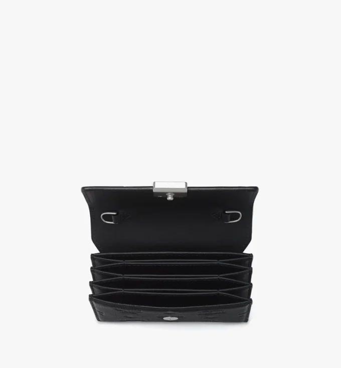 Cartera con cadena Aren en piel con monograma en relieve Cartera con cadena Aren en piel con monograma en relieve